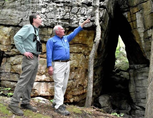 Tow men with binoculars in Needleseye Park